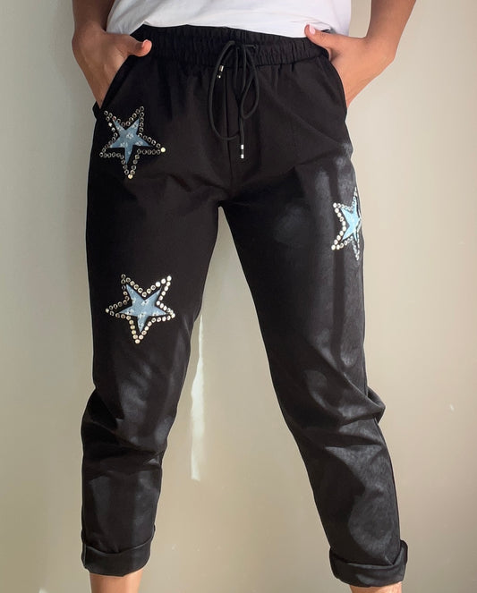 Chandal negro estrellas